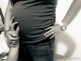 guardian angel hand on pregnant belly