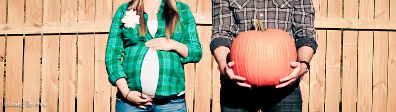 37 week fall maternity photos with pumpkin; maternity photos with husband holding pumpkin