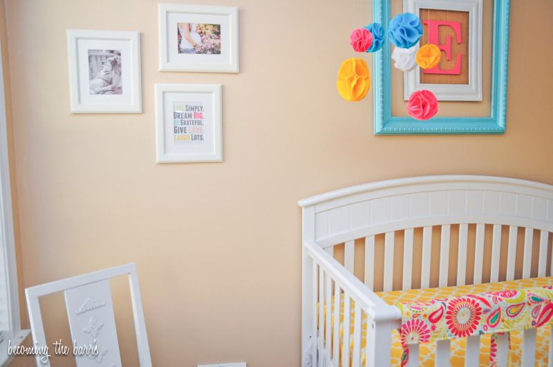 hanging maternity photos in nursery