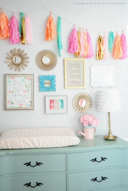 gold teal coral nursery decor; gold teal coral baby room accents; gold teal coral gallery wall above changing table