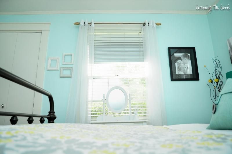 light and airy white aqua master bedroom