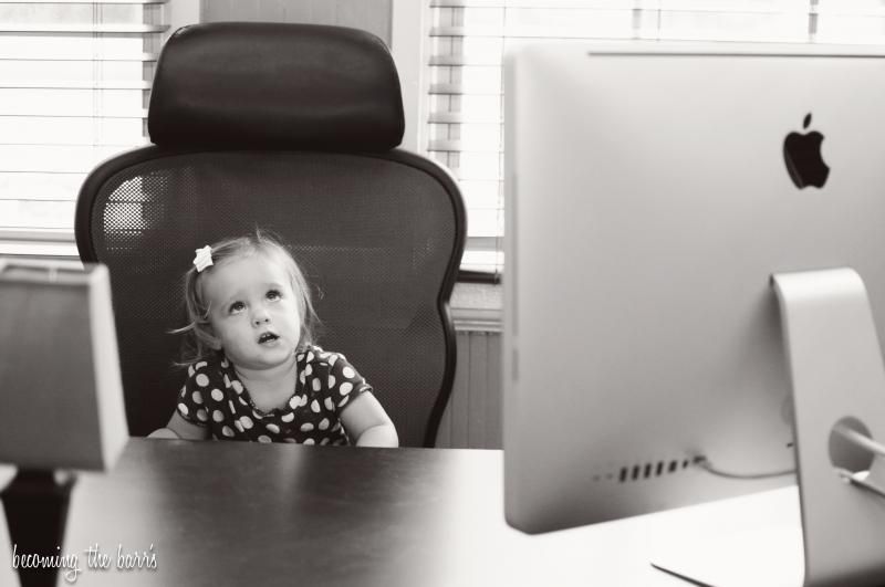 toddler sitting at computer desk