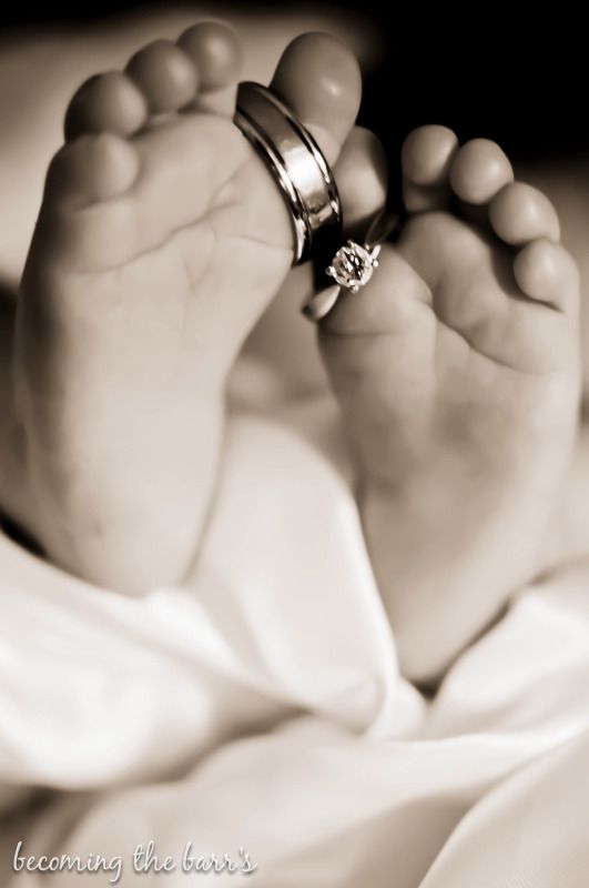 newborn feet with wedding rings photography