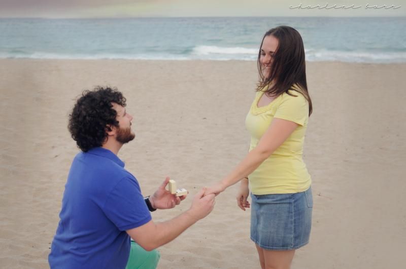 beach proposal photoshoot; surprise engagement photos; photos of actual beach proposal