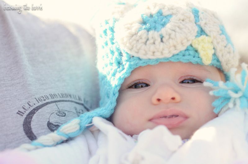 baby girl in owl hat