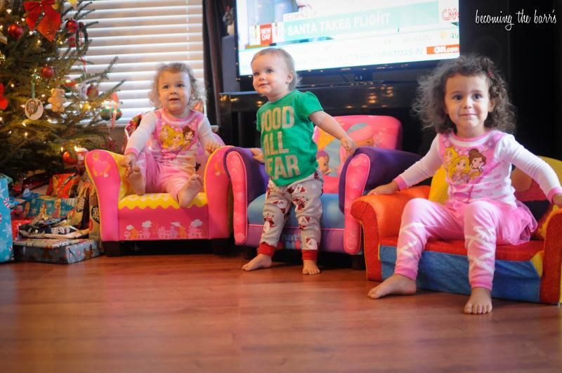 3 girls christmas morning magical faces; eyes light up on christmas morning