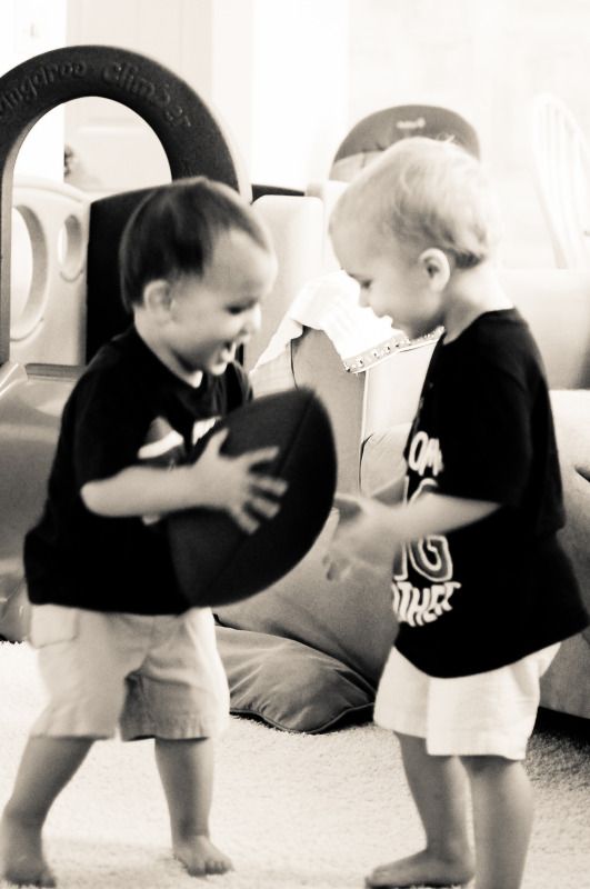 little boys playing football