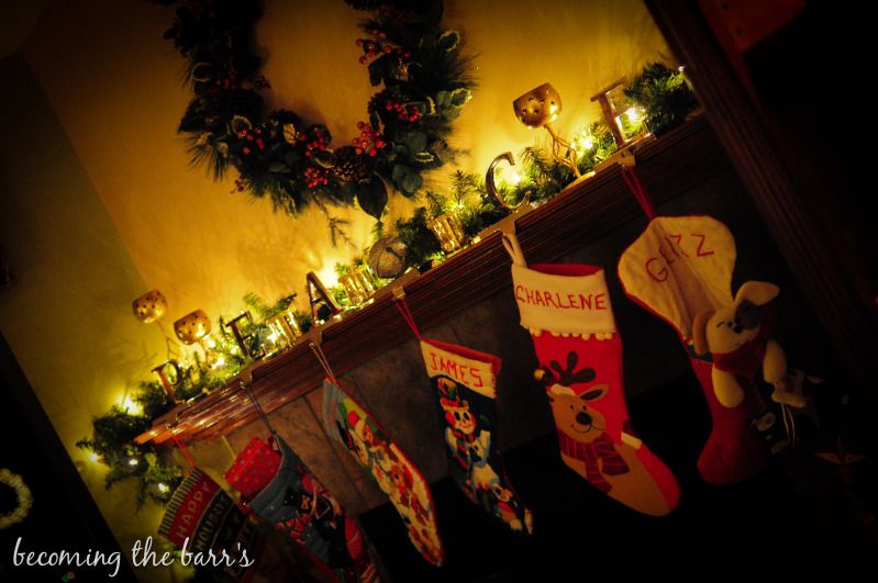 mantle decorated with christmas stockings