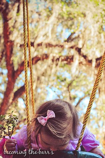 baby girl on swing