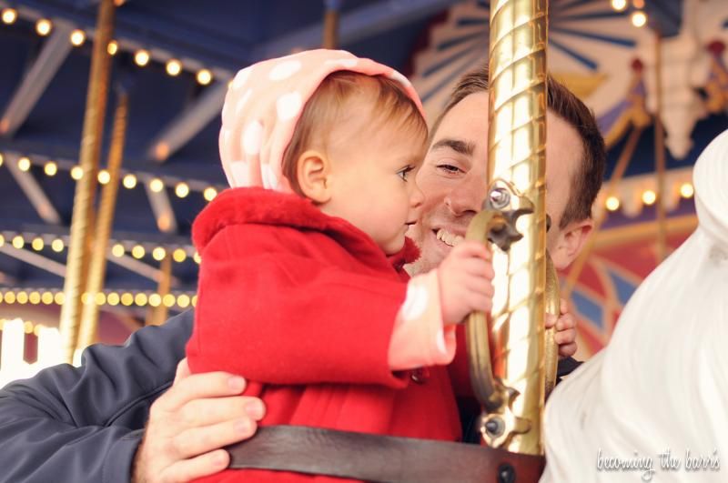 one year old on disney carousel ride