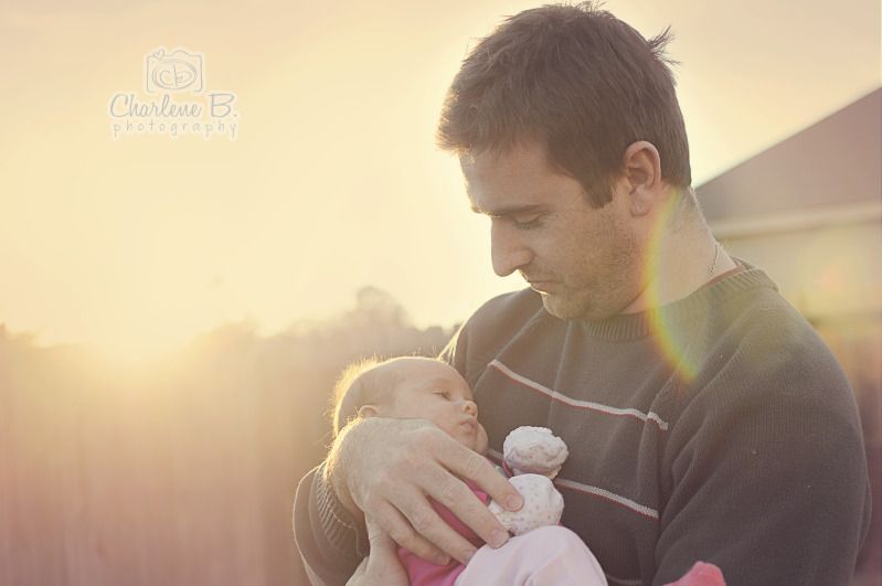 finding the light unique photography; daddy and baby in sunlight