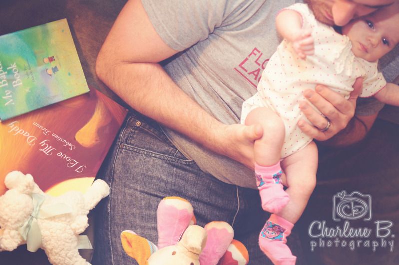 daddy reading to baby girl