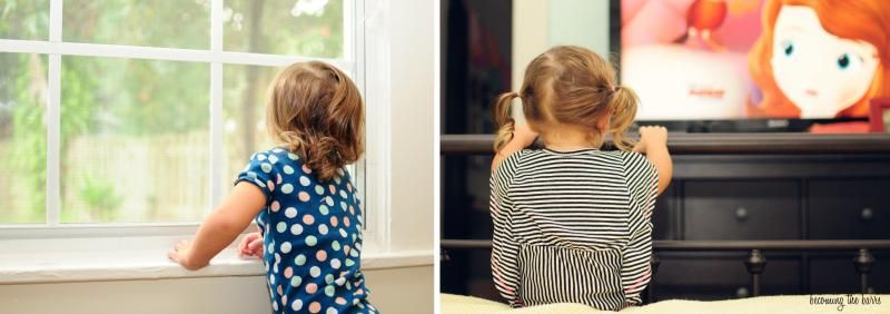 toddler looking out the window and watching tv