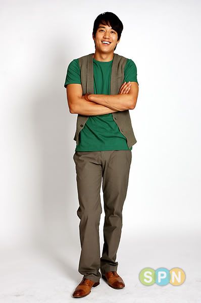 black shirt green pants brown shoes