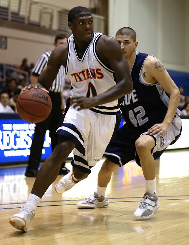 IMAGE: http://img.photobucket.com/albums/v362/bryanlc/Titan%20Photos/11-20%20vs%20Hope%20Int/EB1A7254a_filtered-a.jpg