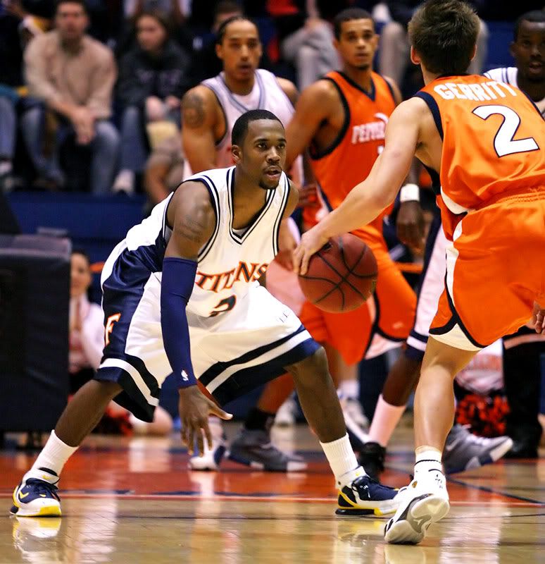 IMAGE: http://img.photobucket.com/albums/v362/bryanlc/Titan%20Photos/11-23%20vs%20Pepperdine/IMG_6953_filtered-a.jpg