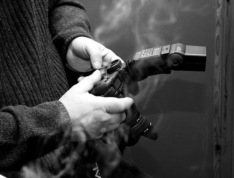 IMAGE: http://img.photobucket.com/albums/v369/scubacowboy/Photography/CameraSmokeSized.jpg