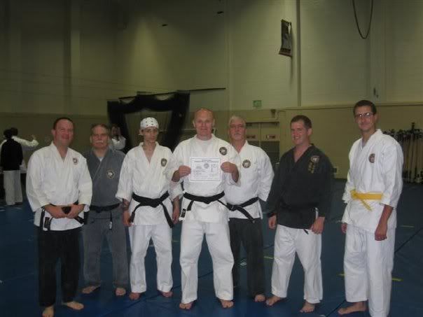 Mr. Hea surrounded by St. Louis dojo attendees