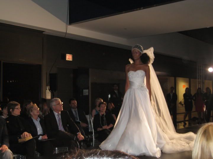  a trio of wedding dresses that were accessorized with a bowed headscarf 