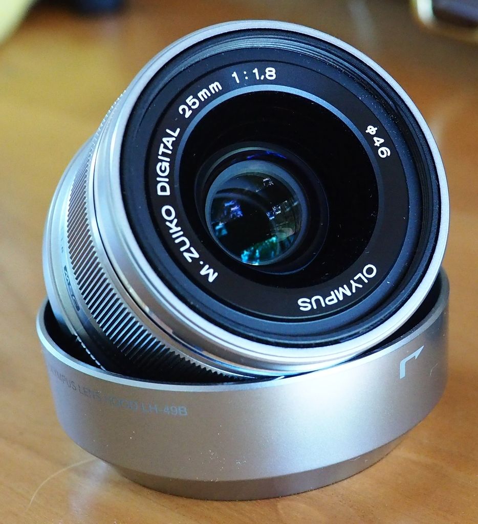 IMAGE: http://img.photobucket.com/albums/v389/dino8031/lens%20front.jpg