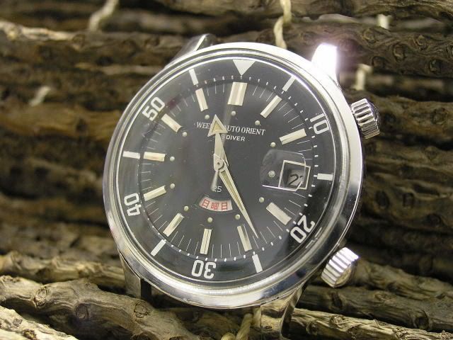 http://img.photobucket.com/albums/v411/kew/Orient%20King%20Diver%2025%20Jewels/OrientKingDiver25Jewels03.jpg