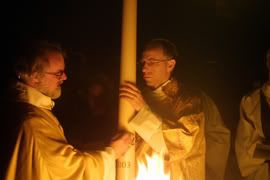 The Archbishop of Canterbury lights the Paschal Candle. Anglican World/James Rosenthal