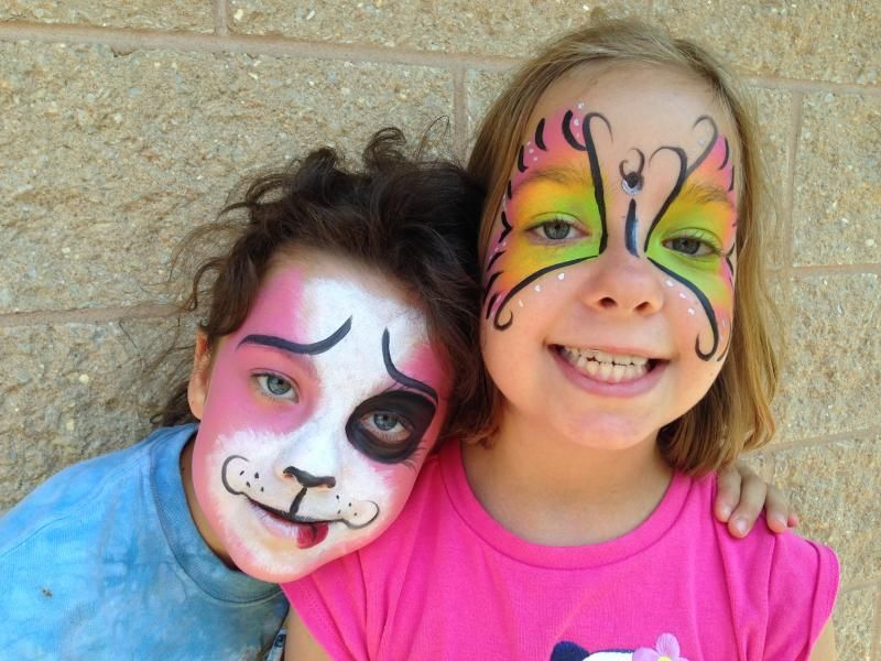 Girls together with faces painted Girls together with faces painted