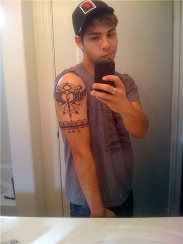  I got awhile agoits a band around the arm and an anime tattoo :P
