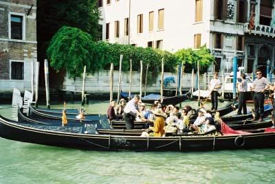 the gondolas traversing the grand canal