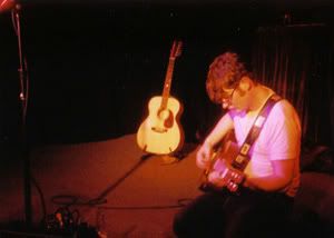 Colin Meloy kneeling