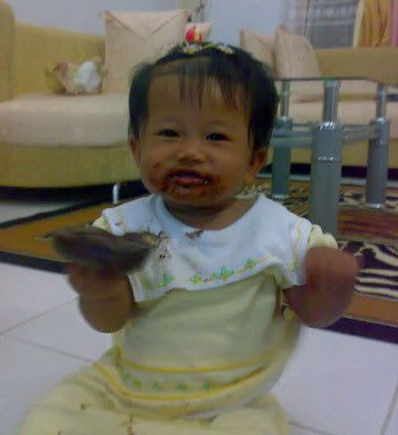 aline with chocolate all over her mouth
