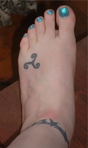 its an ancient celtic symbol called a Triskele or Triskelion.. the band
