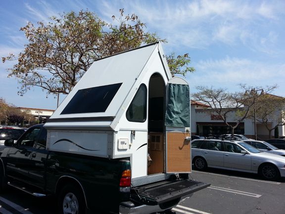 Truck cabin outlet camper