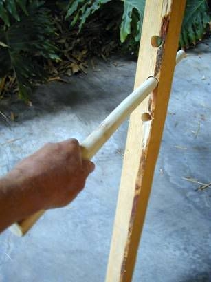 A home made jig used to straighten rattan.