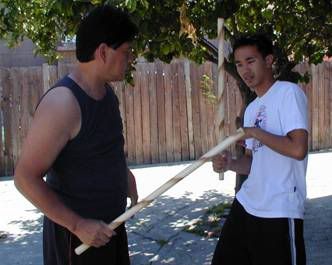 Grand Master Nene Gaabucayan and Francis Smith practice Pakgang.