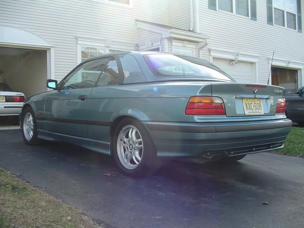 Here's a shot of my old e36 convertible with center mounted trunk brake