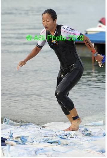 jumping over the rice bags lining the swim exit