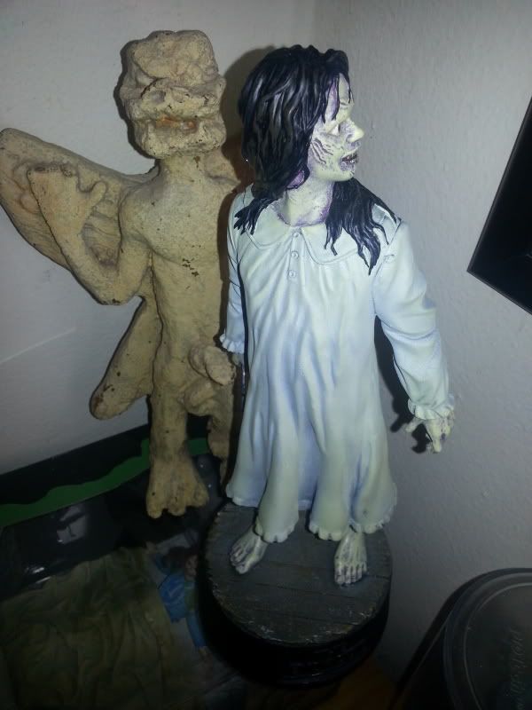 blue exorcist statue