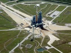 The Space Shuttle Discovery lies atop its pad at Launch Complex 39B at Kennedy Space Center in Florida.