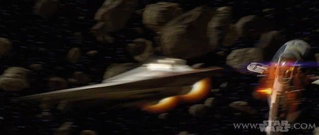 A Jedi Starfighter is pursued in an asteroid field