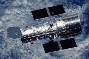 The Hubble Space Telescope following release from a space shuttle during a previous service flight.