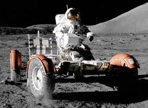 An Apollo astronaut cruisin' around on a lunar rover