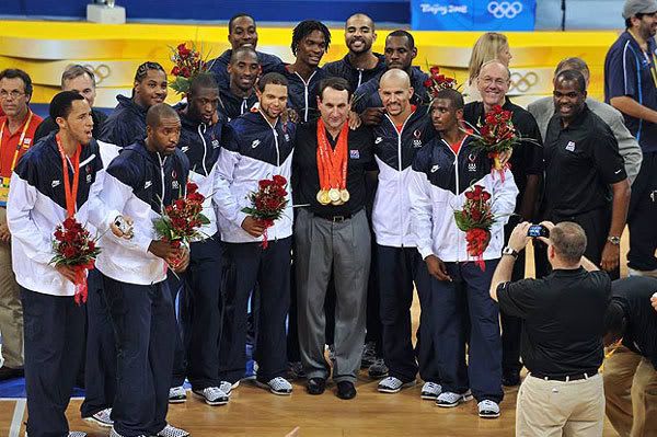 The players and coaches for the Redeem Team pose for a group photo after defeating Spain, 118-107, in the gold-medal basketball game in Beijing, China...on August 24, 2008.