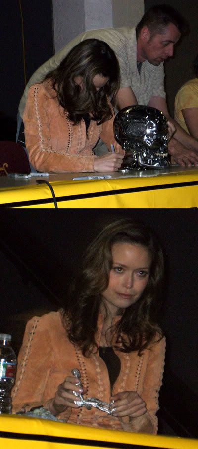 Summer Glau signing and playing with TERMINATOR memorabilia.