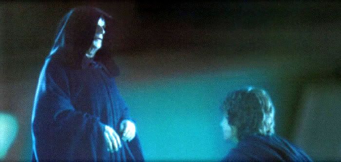 Anakin being congratulated by Darth Sidious after the Jedi slaughter in REVENGE OF THE SITH.