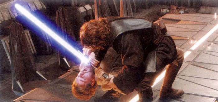 Anakin chokes Obi-Wan while standing atop a Mustafar conference room table.
