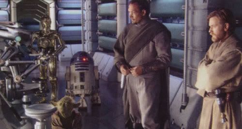 Bail Organa, Obi-Wan Kenobi, Yoda, C-3P0 and R2-D2 watch over an injured Padme (off-screen) in the Polis Massan medical facility.