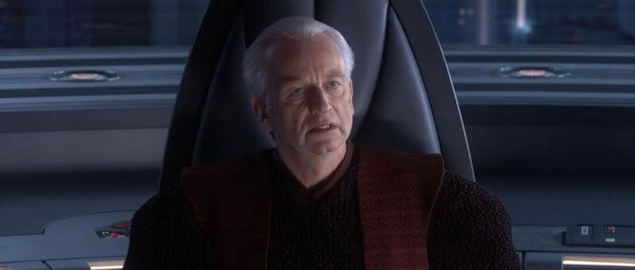 Chancellor Palpatine turns to see who his new arrivals are.