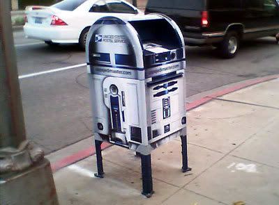 A mailbox shaped like Artoo Detoo.
