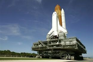 NASA returns Atlantis to the launch pad on August 29 after it is determined that Tropical Storm Ernesto will not pose a danger to the space shuttle.